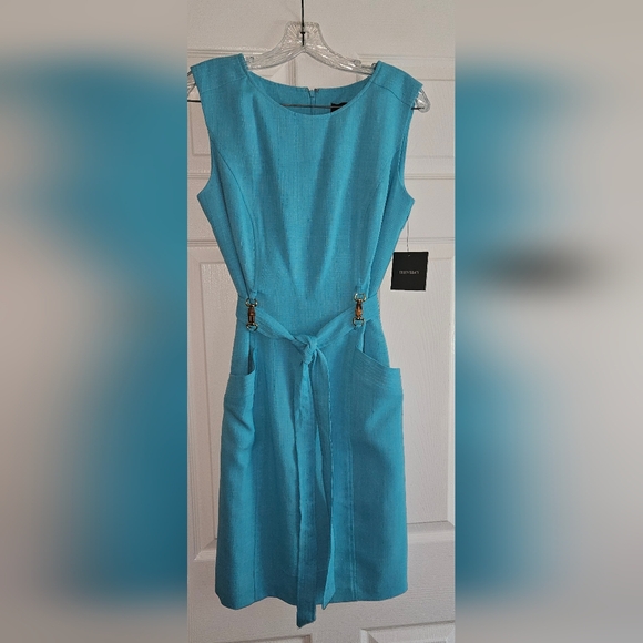 Cocktail length turquoise colored dress. Pockets and belt. Size 8 - Picture 4 of 7
